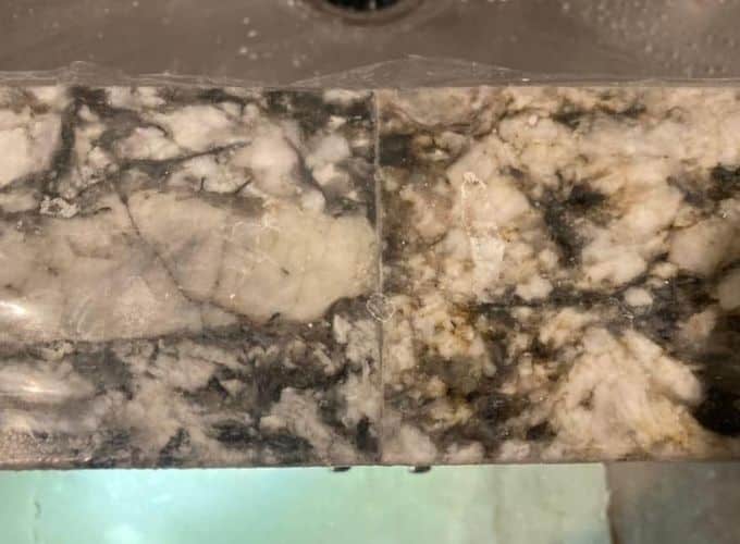 cons about granite countertops